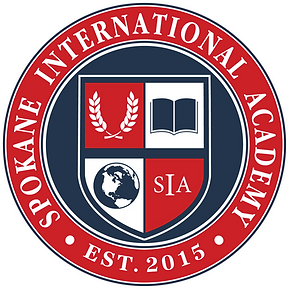 Logo for Spokane International Academy. It is a red circle, with the words Spokane International Academy Est. 2015 around the perimeter. The school shield is in the center. The shield has two white chaffs of wheat on a red background in the upper left-hand quadrant, a stylized blue and white image of an open book on a white background in the upper right-hand quadrant, the lower left quadrant has a two-color (blue and white) image of the Earth on a white background, and the lower right has the letters SIA on a red background. . 